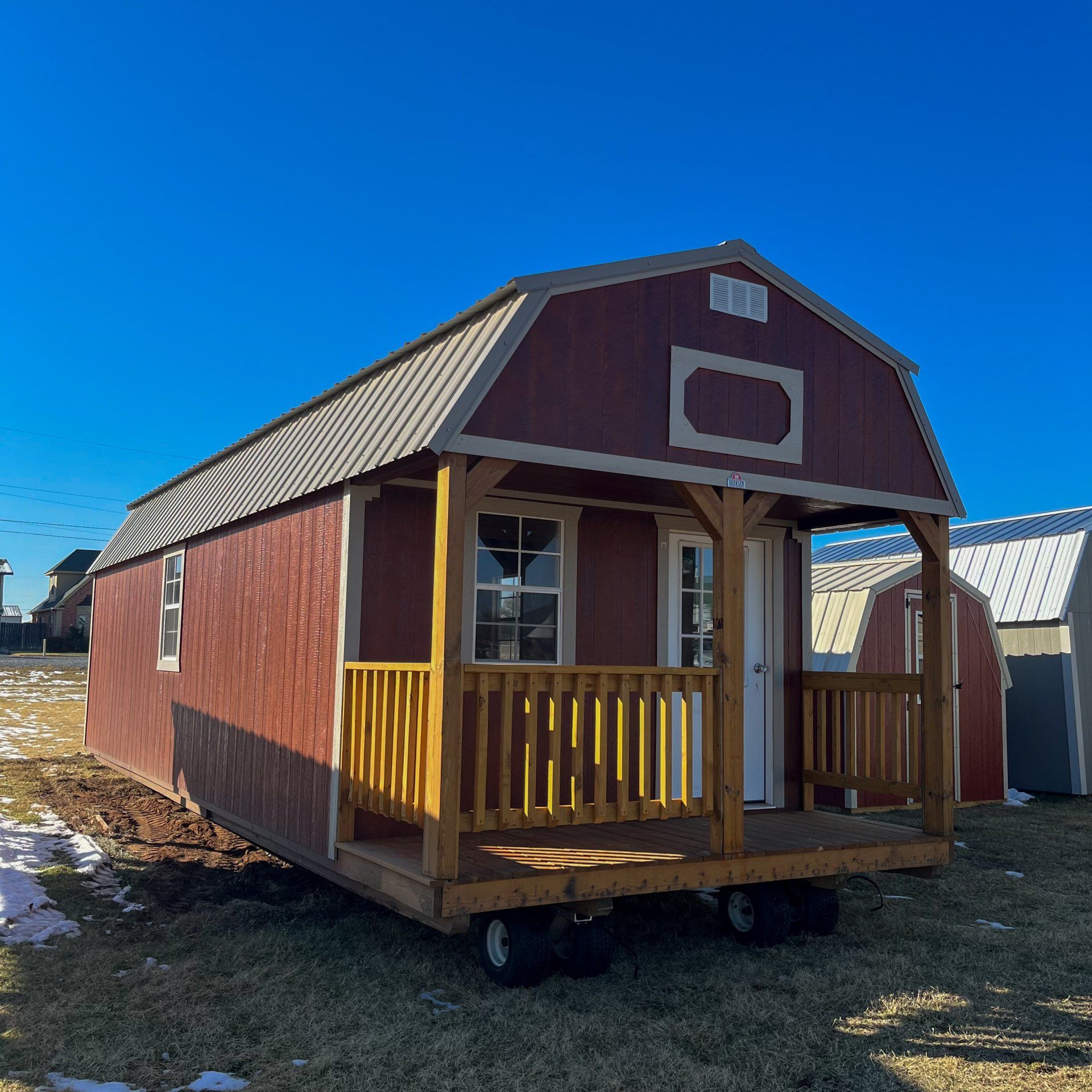 Explore the 12x32 Lofted Barn Cabin with stylish design, Mahogany